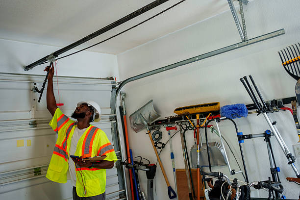 Professional Garage Door Panel Replacement technician working in Delaware County County, OK